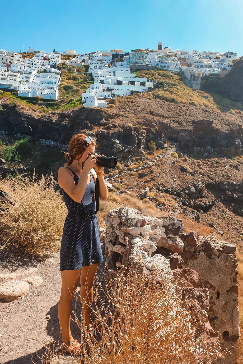 Julia Taking Photos in Best Photography Spots in Santorini