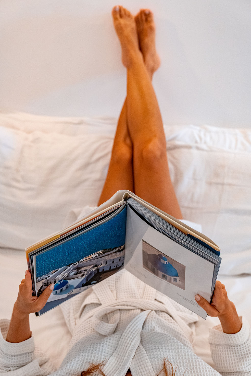 Legs Up The Wall Reading Book in Santorini