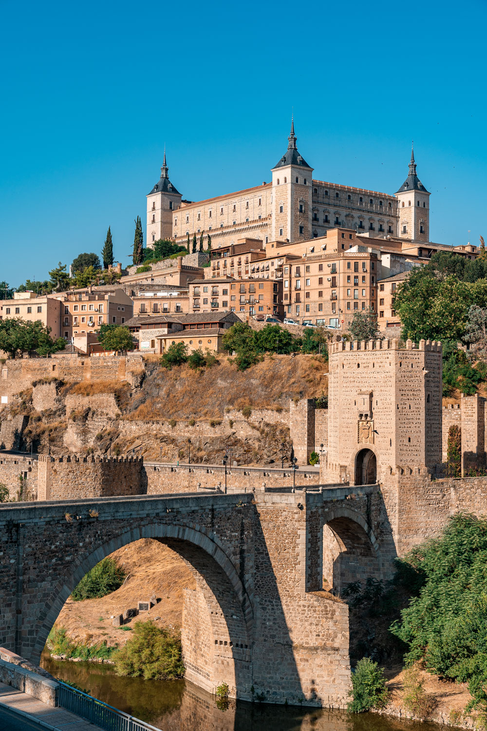 Toledo travel guide - Alcantara bridge with city views