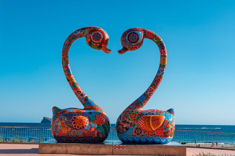 Heart-shaped colorful swan statues