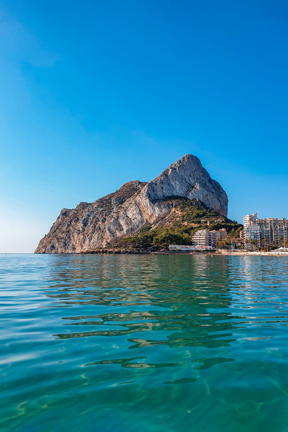 Clear waters in Calpe scenic beach.