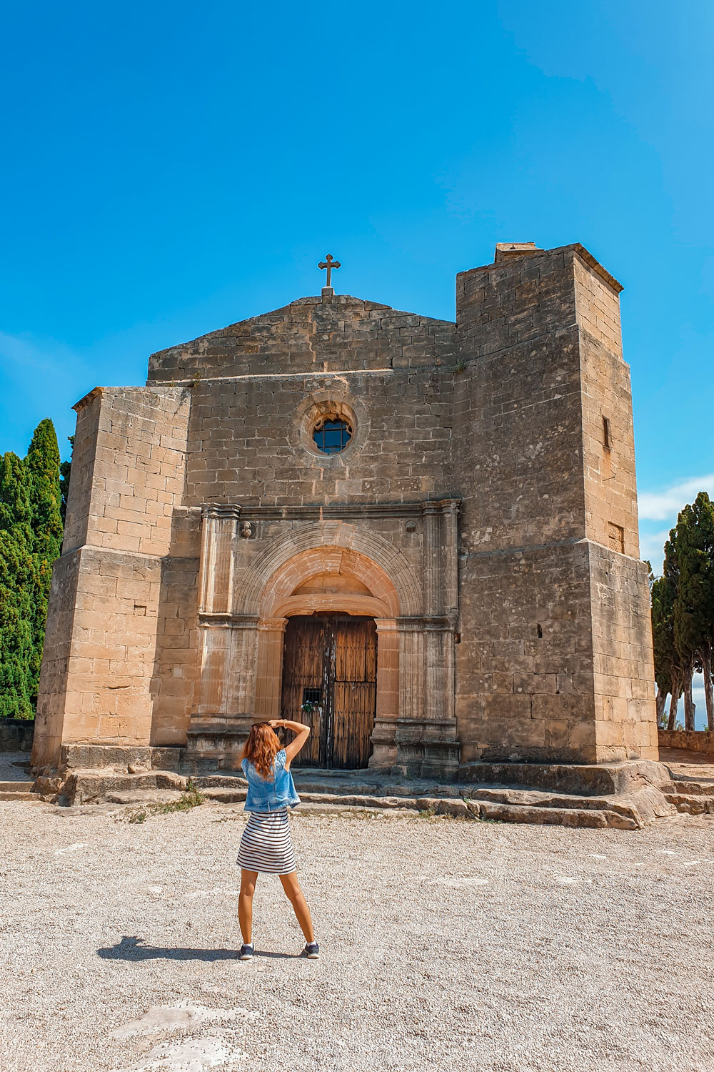 Julia taking picture of the church in Cretas.