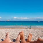 Couple relaxing on the beach.