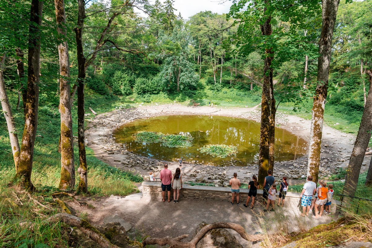 Visitor near Kaali meteorite crater.