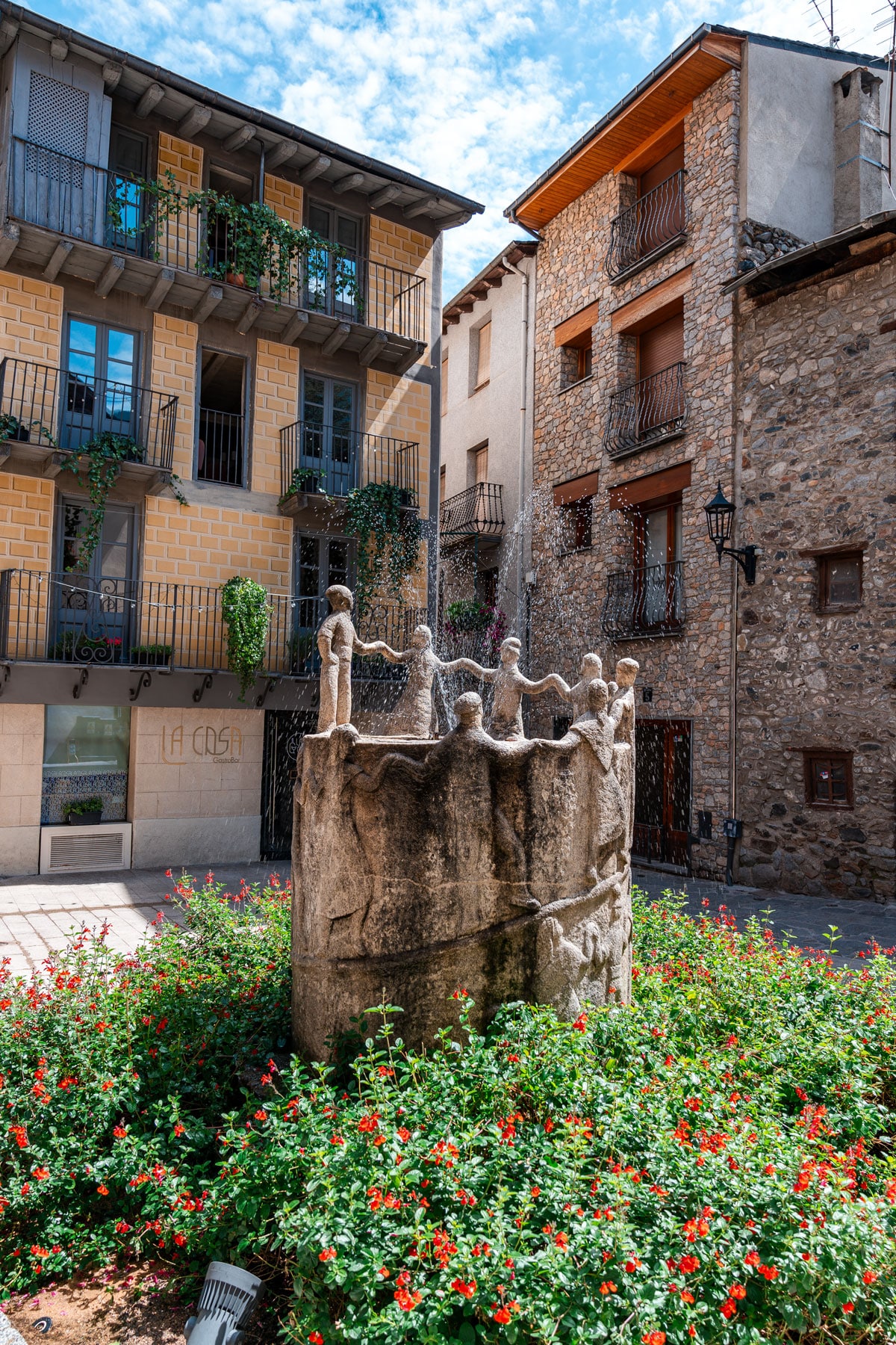 Ball del Contrapàs fountain in a small square in the old town.