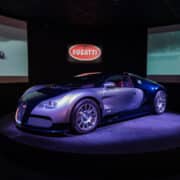 A modern Bugatti on display at the Mulhouse Car Museum in France. Our visit to the Schlumpf Collection covers tickets, parking, how long to allow, stroller access and the children’s play area.