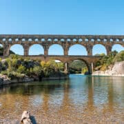 Only have a couple of hours for Pont du Gard? Here is what a short visit to this huge Roman aqueduct in the south of France is really like, from left-bank parking to the pebble riverbank below. Great for a France road trip and worked well with kids.